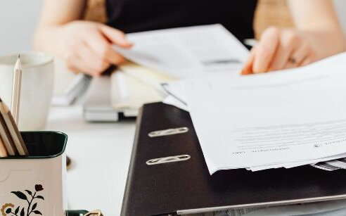 women working on paperwork