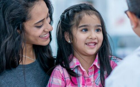 girl and mom at appointment
