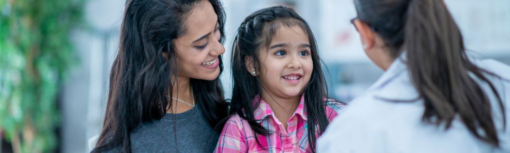 girl and mom at appointment